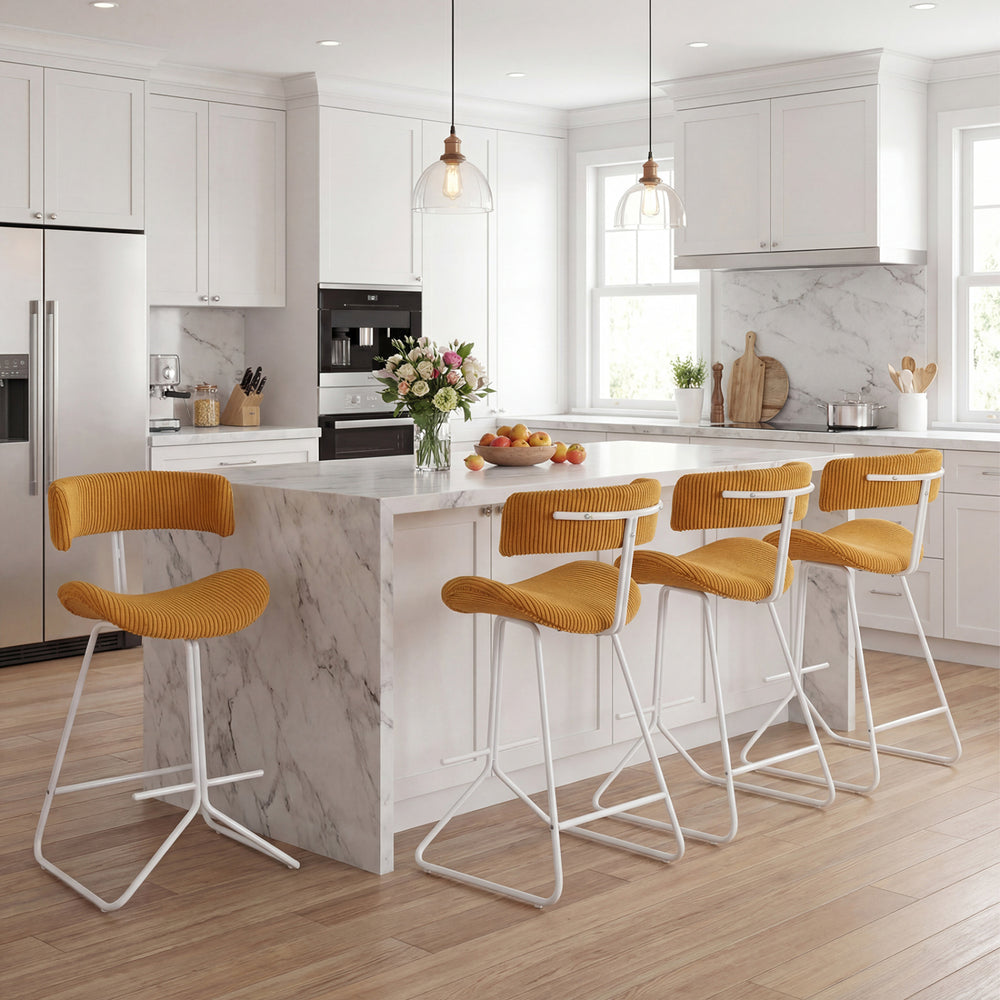 Counter height stool set with orange corduroy seats and white metal bases, perfect for 34"-36" high counters.