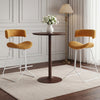 Set of 2 armless counter height stools with orange corduroy seats and sleek metal bases, perfect for 34"-36" tables.