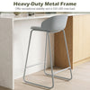 Counter height bar stool with a curved backrest and sturdy metal frame, offering exceptional stability and comfort.