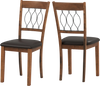 Set of 2 walnut dining chairs with padded faux leather seats and elegant hallow back for comfortable dining.