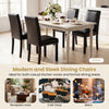 Set of 2 dining chairs with solid rubber wood legs, padded seats, and elegant nailhead accents for versatile dining.