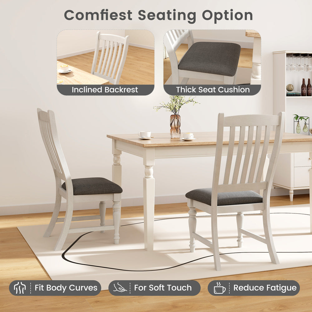Set of 2 white dining chairs with solid wood legs, featuring an inclined backrest and thick seat cushion for comfort.