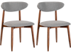 Gray fabric upholstered dining chair with a padded seat and curved back, offering modern farmhouse style and comfort.
