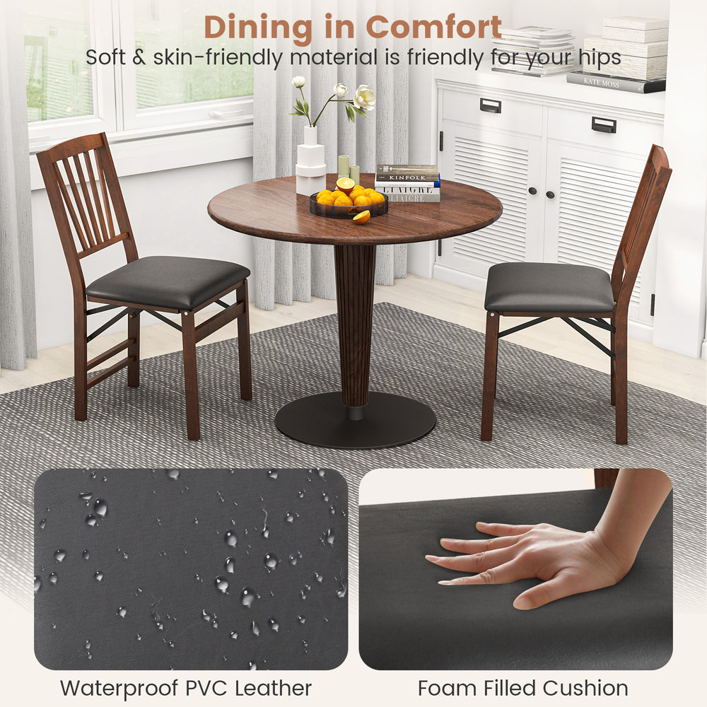 Set of 2 folding chairs with padded seats, rubber wood frame, and waterproof PVC leather for comfortable dining.