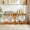 Set of 2 folding luggage racks in acacia wood with nylon straps and slatted shelves, perfect for guest room.