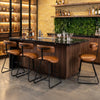 Modern counter height stools with espresso faux leather upholstery, curved seat, and stable metal base for comfortable.