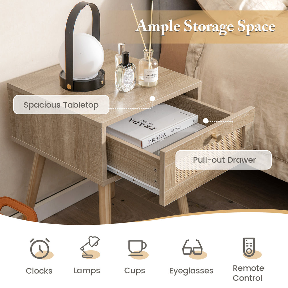 Modern rattan nightstand with pull-out drawer and solid wood legs, featuring a spacious tabletop for bedroom decor.