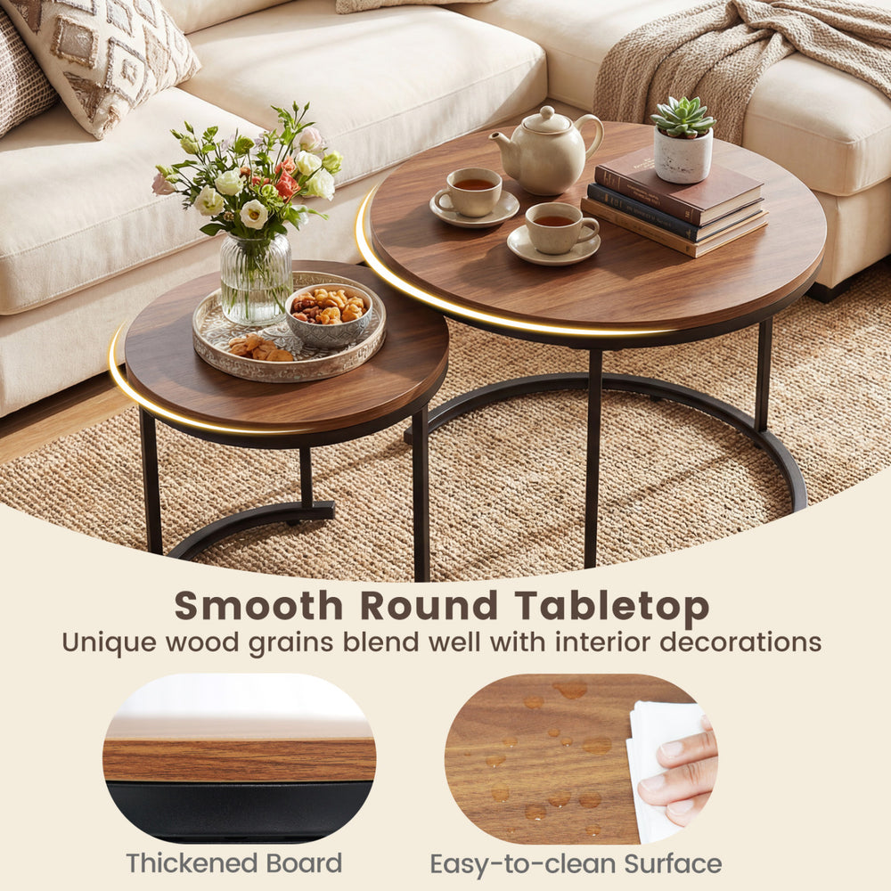 Set of 2 modern round nesting coffee tables in light brown, featuring a smooth surface and vintage design for versatile.