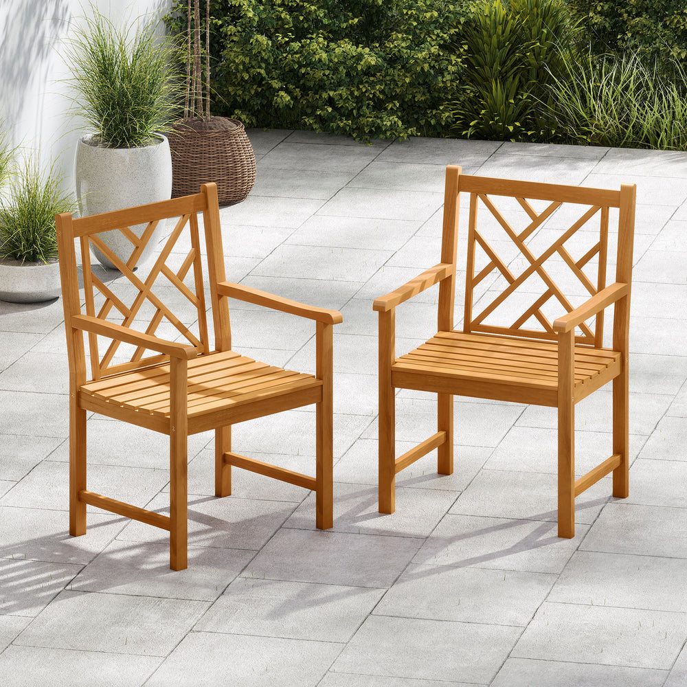 Set of 2 acacia wood outdoor dining chairs with cross-pattern backrest, perfect for patio or garden use.