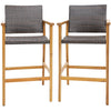 Set of 2 PE wicker patio bar chairs with acacia wood armrests, featuring a curved seat and adjustable footpads for.