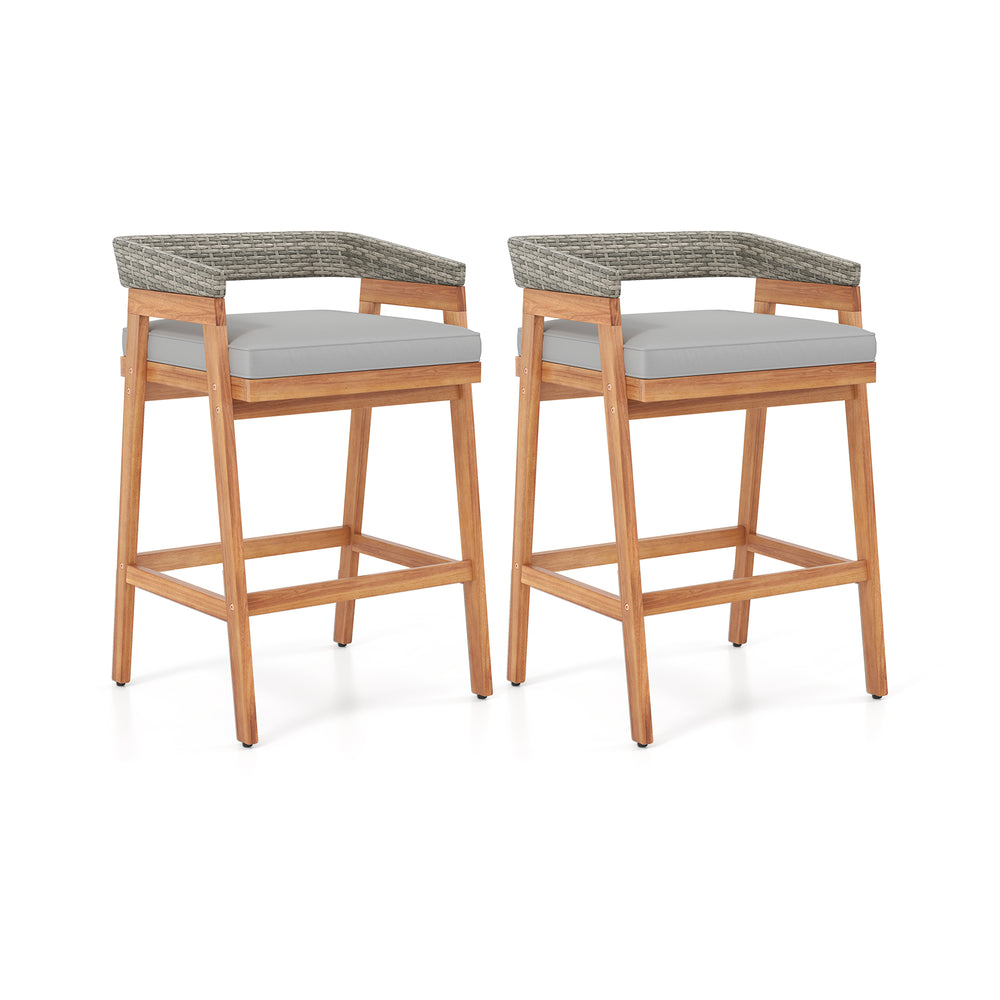Set of 2 acacia wood counter height bar stools with gray cushions and PE wicker backrests, perfect for patio use.