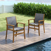 Set of 2 patio dining chairs with acacia wood frame and breathable fabric, perfect for outdoor relaxation by the pool.