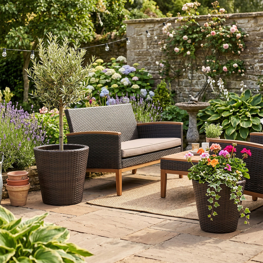 Tall and small brown tapered rattan planters with drainage holes, perfect for indoor and outdoor use in any garden setting.