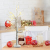 Pre-lit white twig birch tree with bendable branches, ideal for indoor Christmas decoration, showcasing vivid bark.