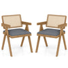 Set of 2 gray rattan accent chairs with padded cushions and rubber wood frame, perfect for dining or living room decor.