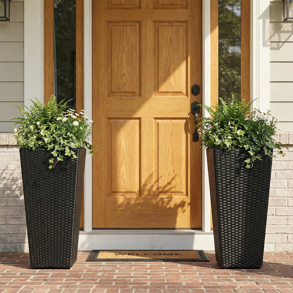Set of 2 black rattan tall plant pots with detachable liners, perfect for porch or garden use.