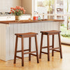 Set of 2 walnut saddle-seat counter height stools with curved seats and footrests, perfect for kitchen or dining areas.