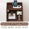 Nightstand with charging station in walnut finish, featuring open compartment and two drawers for organized storage.