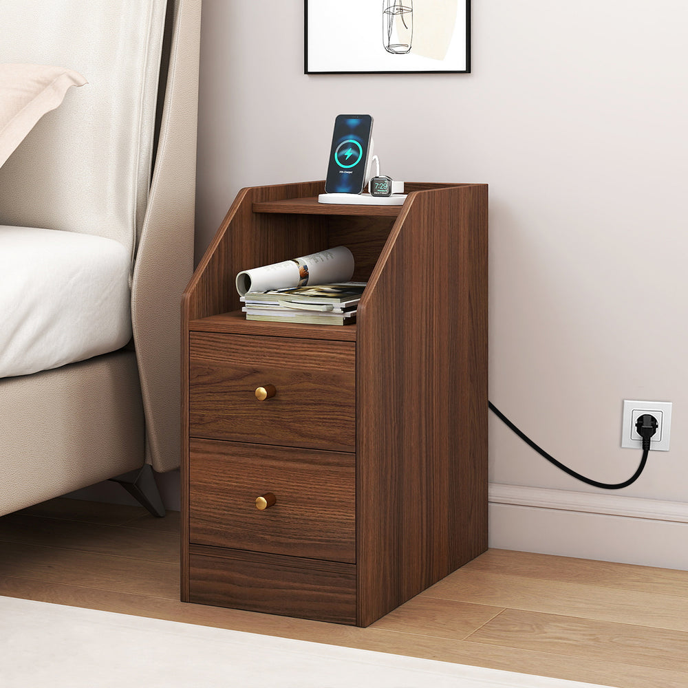 Walnut side end table with charging station, open compartment, and two drawers for organized storage beside a sofa.