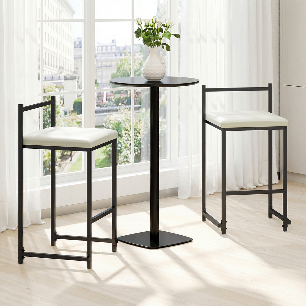 Set of 2 black stackable counter height bar stools with PU leather upholstery and footrest for kitchen island use.
