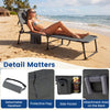 Portable gray tanning chair with adjustable backrest and side pocket, perfect for beach or patio lounging.