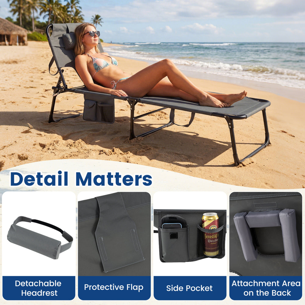 Portable gray tanning chair with adjustable backrest and side pocket, perfect for beach or patio lounging.