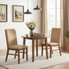 Upholstered dining chairs with solid rubber wood legs in brown, featuring high backrests and wide seats for comfort.