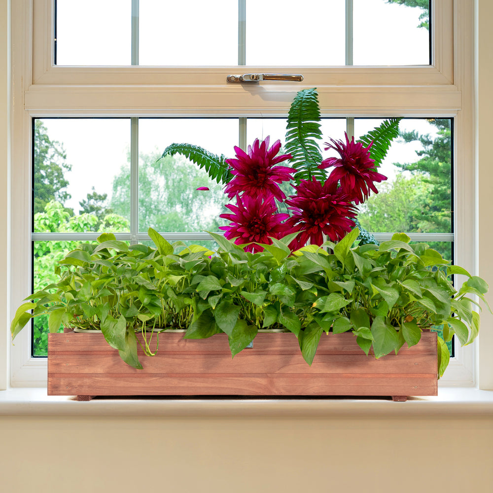 Wooden decorative raised garden bed with vibrant flowers and greenery, perfect for indoor or outdoor window displays.
