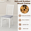 White wooden dining chair with rubber wood legs, padded seat, and ladder back design for comfort and style in any.
