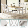 White wooden dining chairs with high backrest and double X-shaped design, perfect for farmhouse-style kitchens.