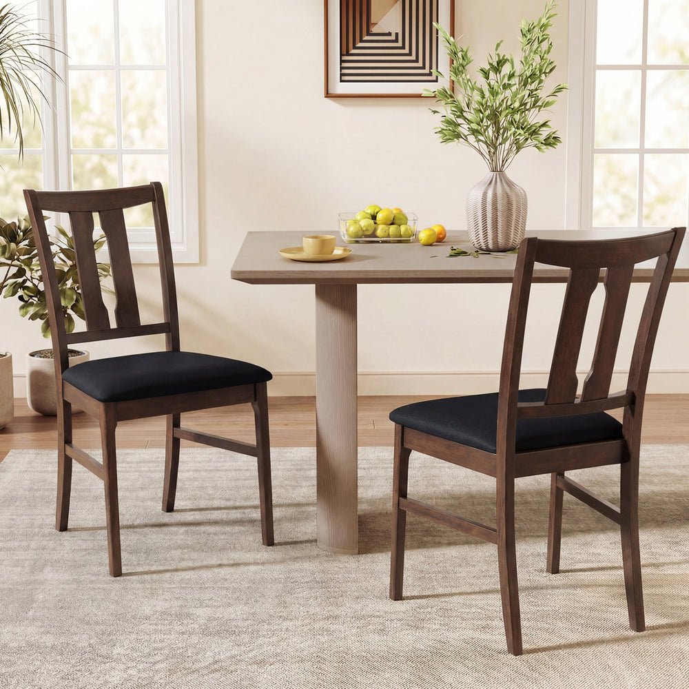 Set of 2 walnut wooden dining chairs with upholstered seats, featuring high curved backs for ergonomic support.