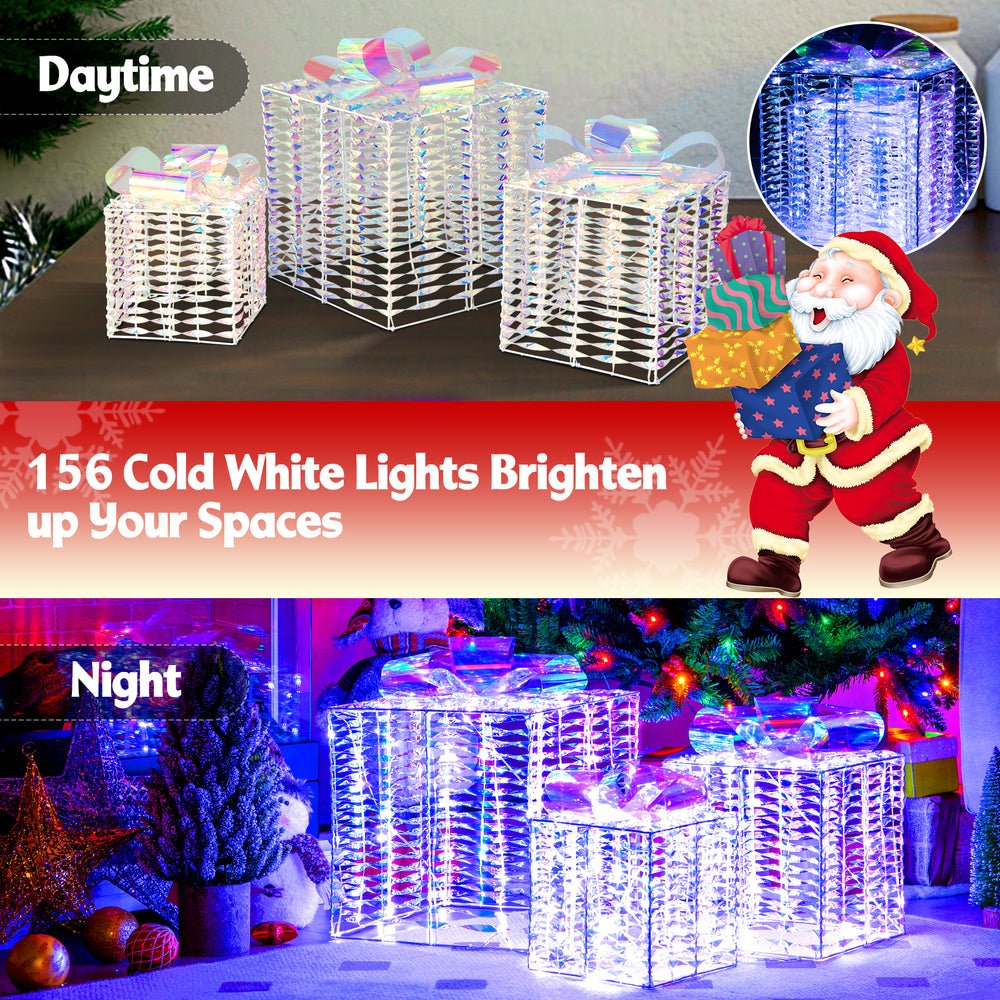 Set of 3 iridescent Christmas gift boxes with bows, featuring 156 cold white lights, perfect for outdoor holiday decor.
