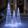 Three pre-lit Christmas cone trees in cold white with star strings, perfect for festive outdoor decoration.