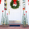 Set of three tower-shaped Christmas trees in metal, featuring removable star toppers and festive reindeer patterns for.