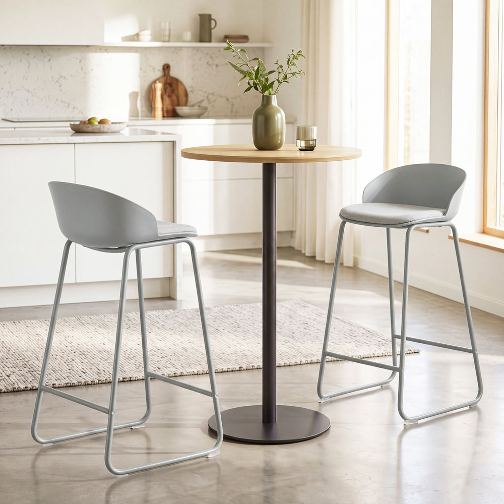 Counter height bar stools with curved backrest and metal frame in gray, perfect for kitchen dining and offering comfort.