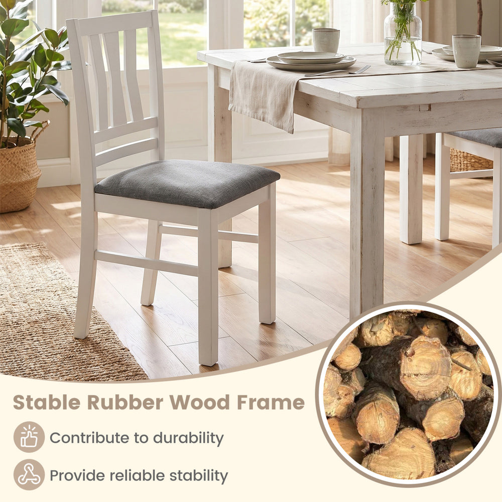 White upholstered kitchen chair with rubber wood frame, featuring a slatted backrest for support and modern farmhouse.