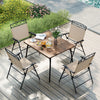 Top view of a patio dining setup featuring a table and four beige folding chairs, perfect for outdoor gatherings.