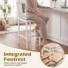 Upholstered barstool with integrated footrest, solid rubber wood frame, and 29.5-inch height for kitchen or dining use.