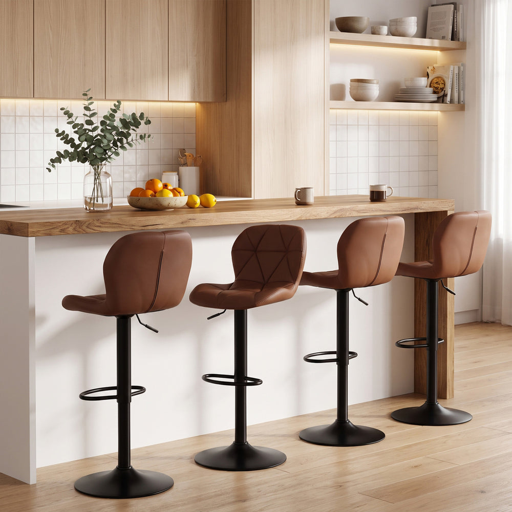 Set of 4 brown upholstered swivel bar stools with curved backs and adjustable height, ideal for kitchen islands or home bars.