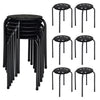 Set of 6 black portable stack stools with sturdy steel frames and breathable PP seats, ideal for home and office use.