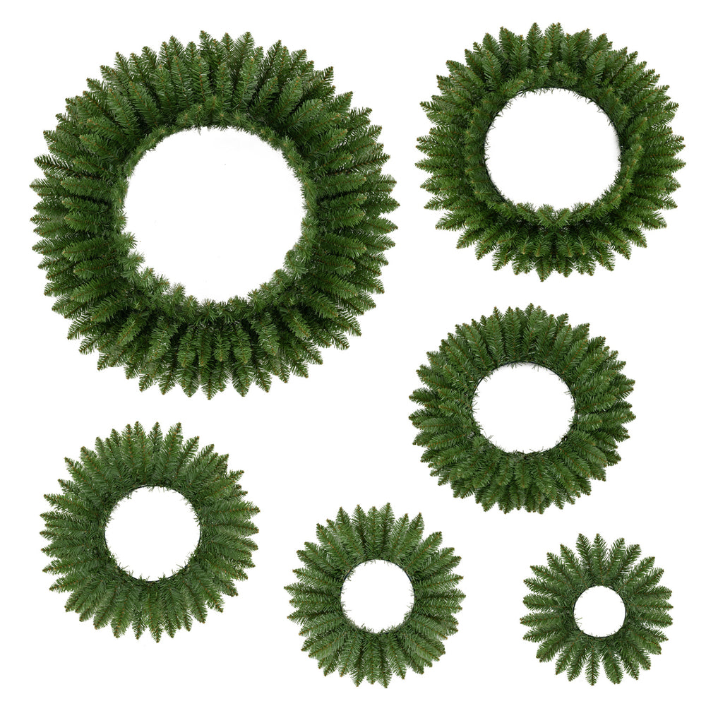 Set of 6 unlit artificial Christmas wreaths featuring realistic greenery for versatile indoor and outdoor decoration.