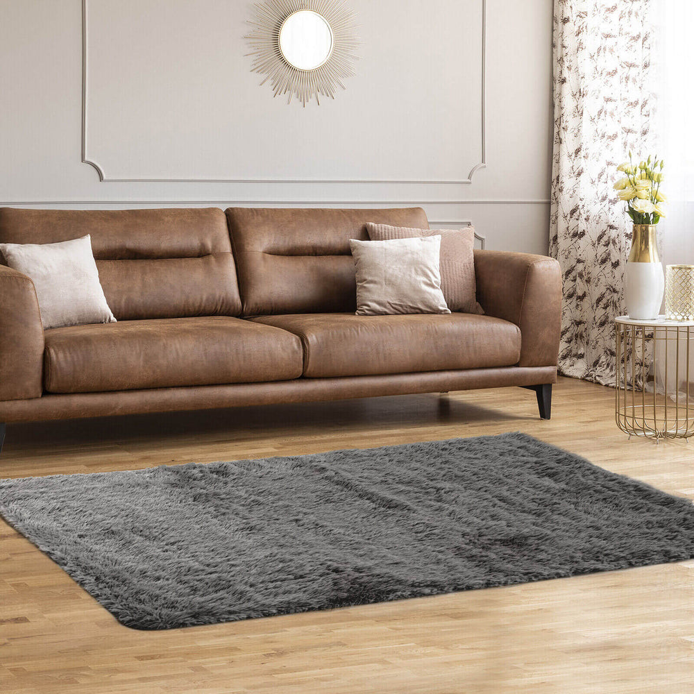Gray 5 x 7 feet modern soft shag area rug with plush texture, enhancing comfort and style in any living space.