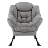 Cozy gray Sherpa upholstered accent chair with ergonomic backrest, head pillow, and button tufted design for relaxation.