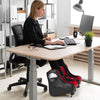 Shiatsu kneading foot massager in red, featuring vibration and heating modes, positioned under a desk for relaxation.
