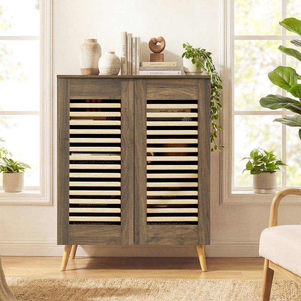 Shoe cabinet with louvered doors in walnut finish, featuring removable shelves for versatile shoe storage and stylish.