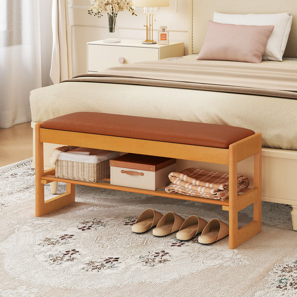 Shoe rack bench with brown PU leather seat and rubberwood frame, featuring flip-open storage and open shelf for shoes.
