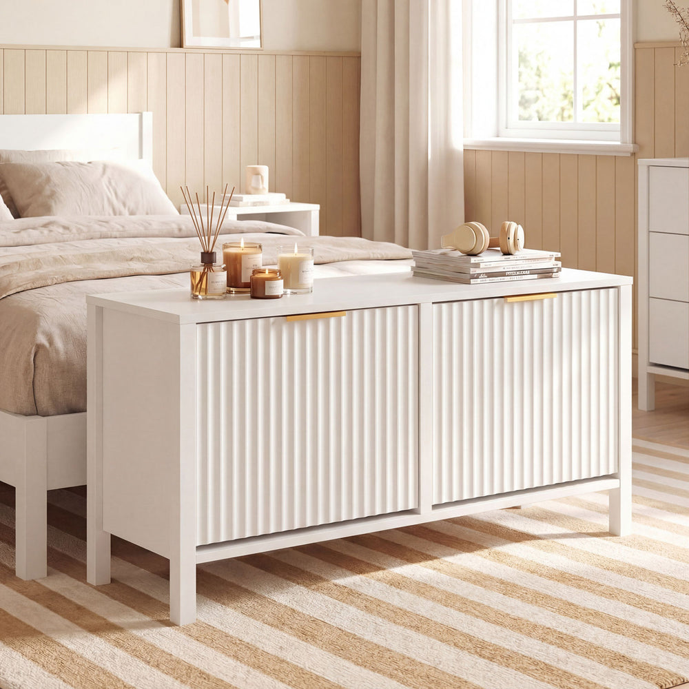 Narrow white shoe storage bench featuring elegant handles and spacious flip drawers, ideal for stylish entryway.