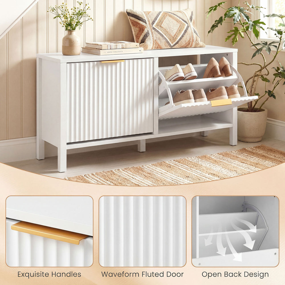 Narrow white shoe storage bench with fluted doors, adjustable shelves, and elegant handles for entryway organization.