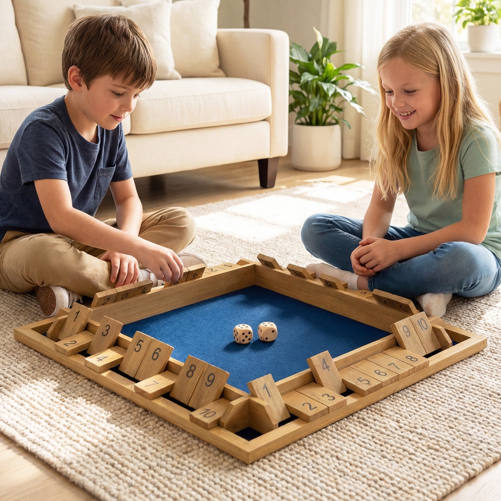Children playing the 24-inch extra-large Shut The Box game, featuring premium pine wood and silk-screened numbers.