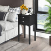 Black side table with two drawers, made of non-toxic MDF, perfect for bedroom or living room decor.